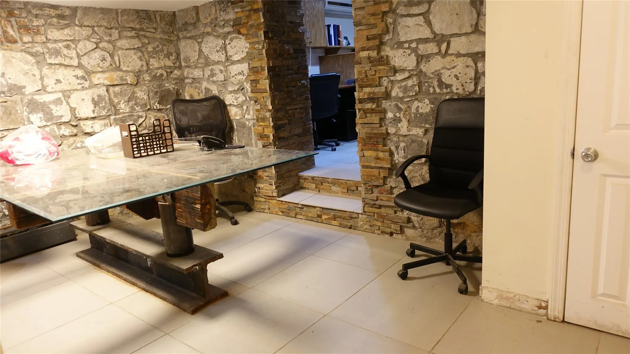 Unfurnished office featuring tile patterned floors Unfurnished office featuring tile patterned floors