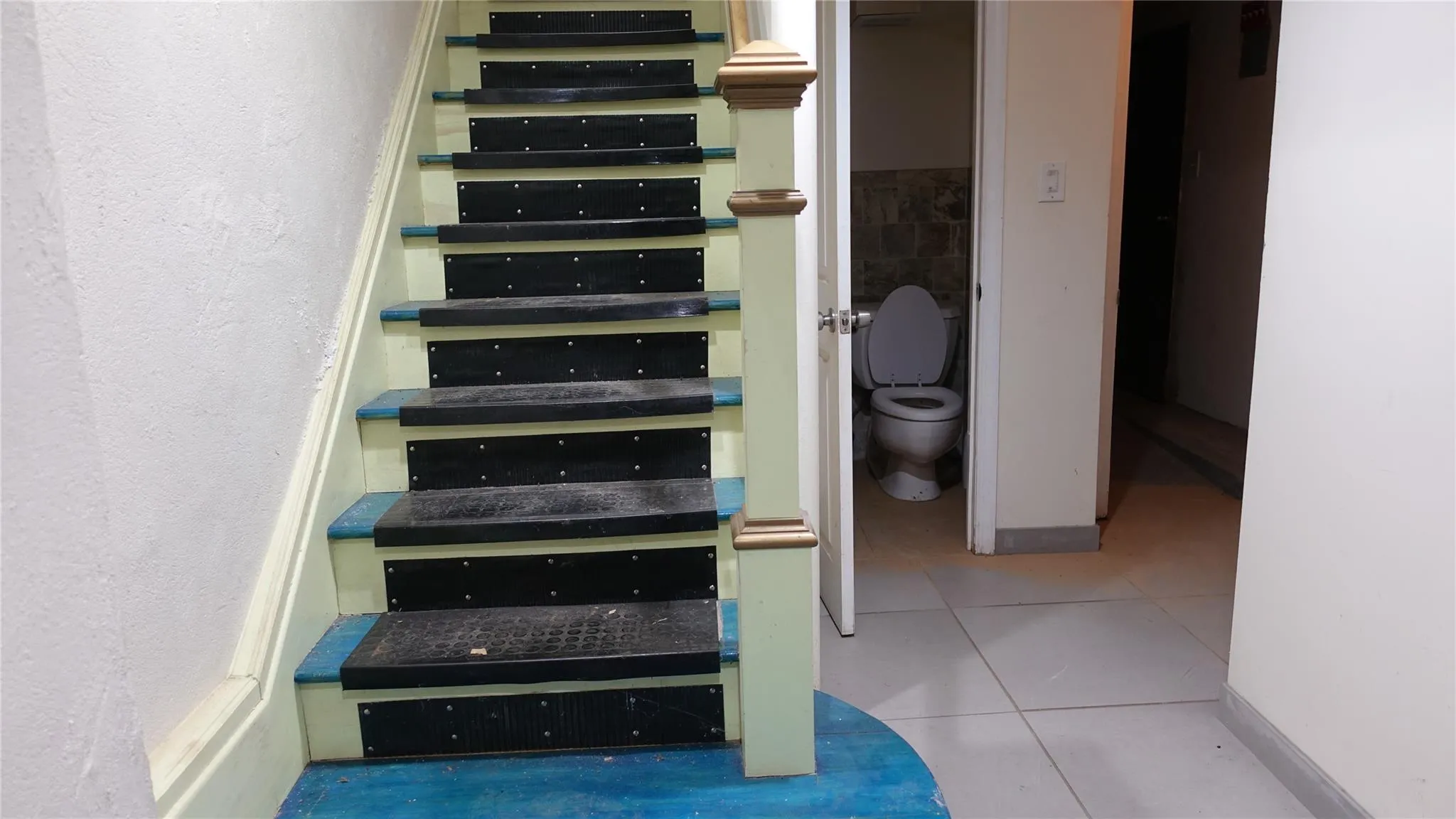 Stairs with tile patterned flooring Stairs with tile patterned flooring