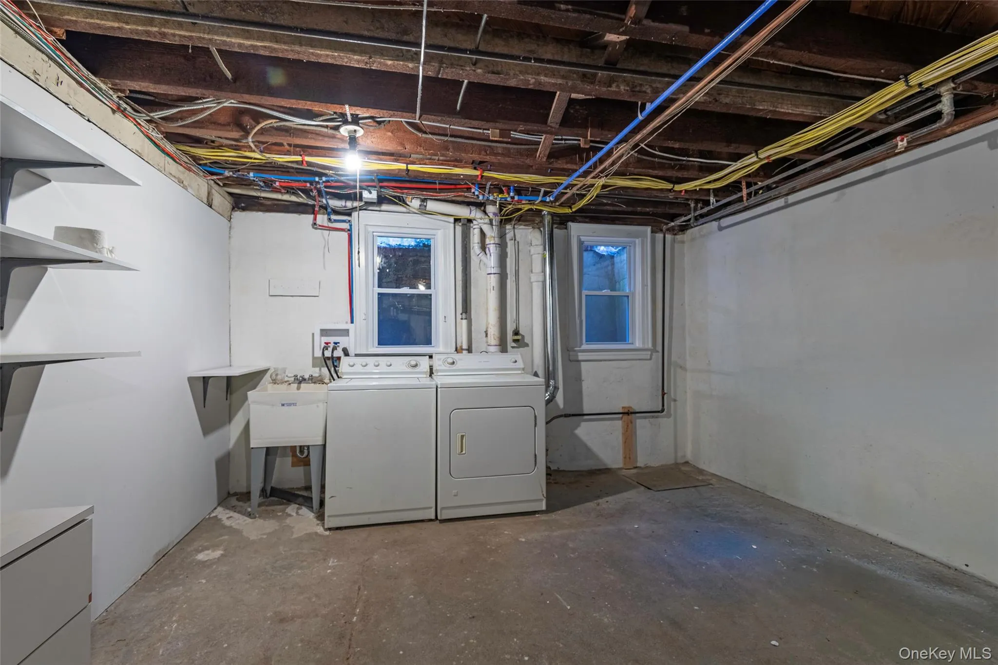 Basement featuring washer and dryer Basement featuring washer and dryer