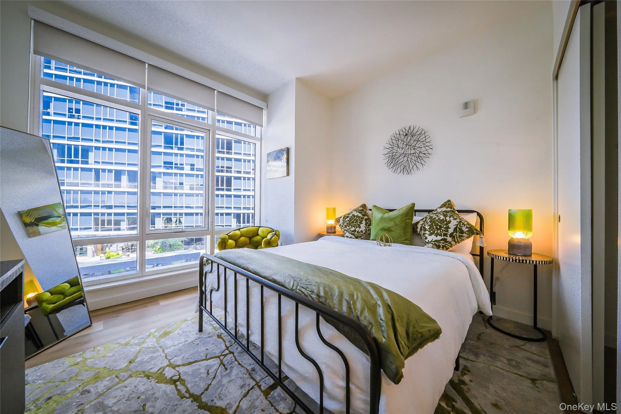 Bedroom featuring wood finished floors Bedroom featuring wood finished floors