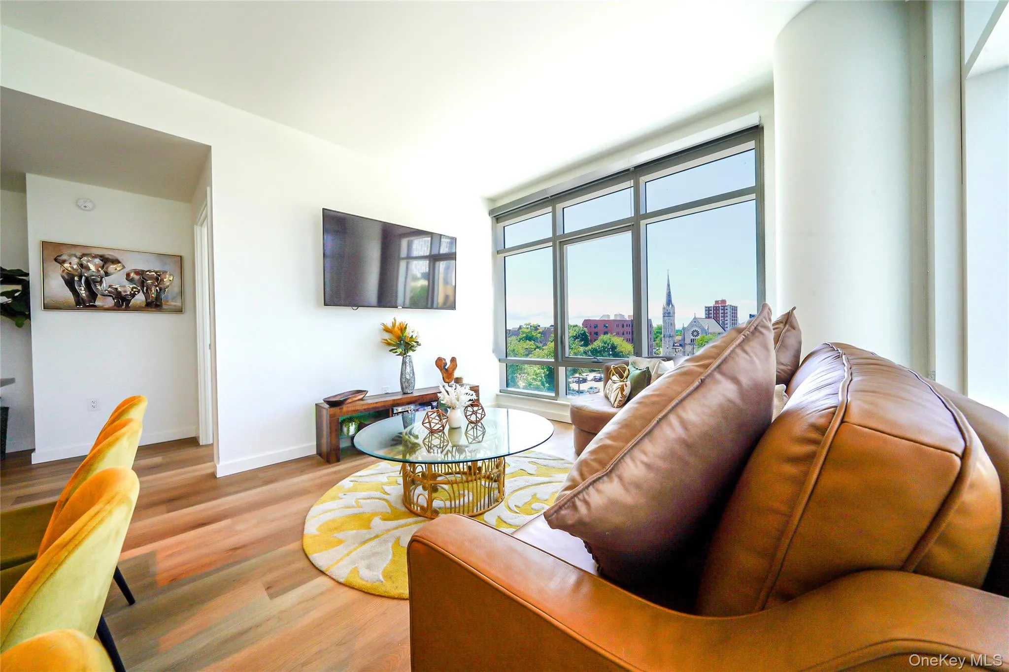Living room with wood finished floors and baseboards Living room with wood finished floors and baseboards