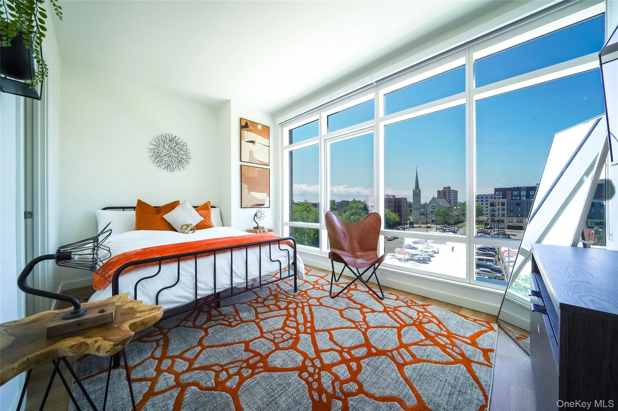Bedroom featuring wood finished floors Bedroom featuring wood finished floors