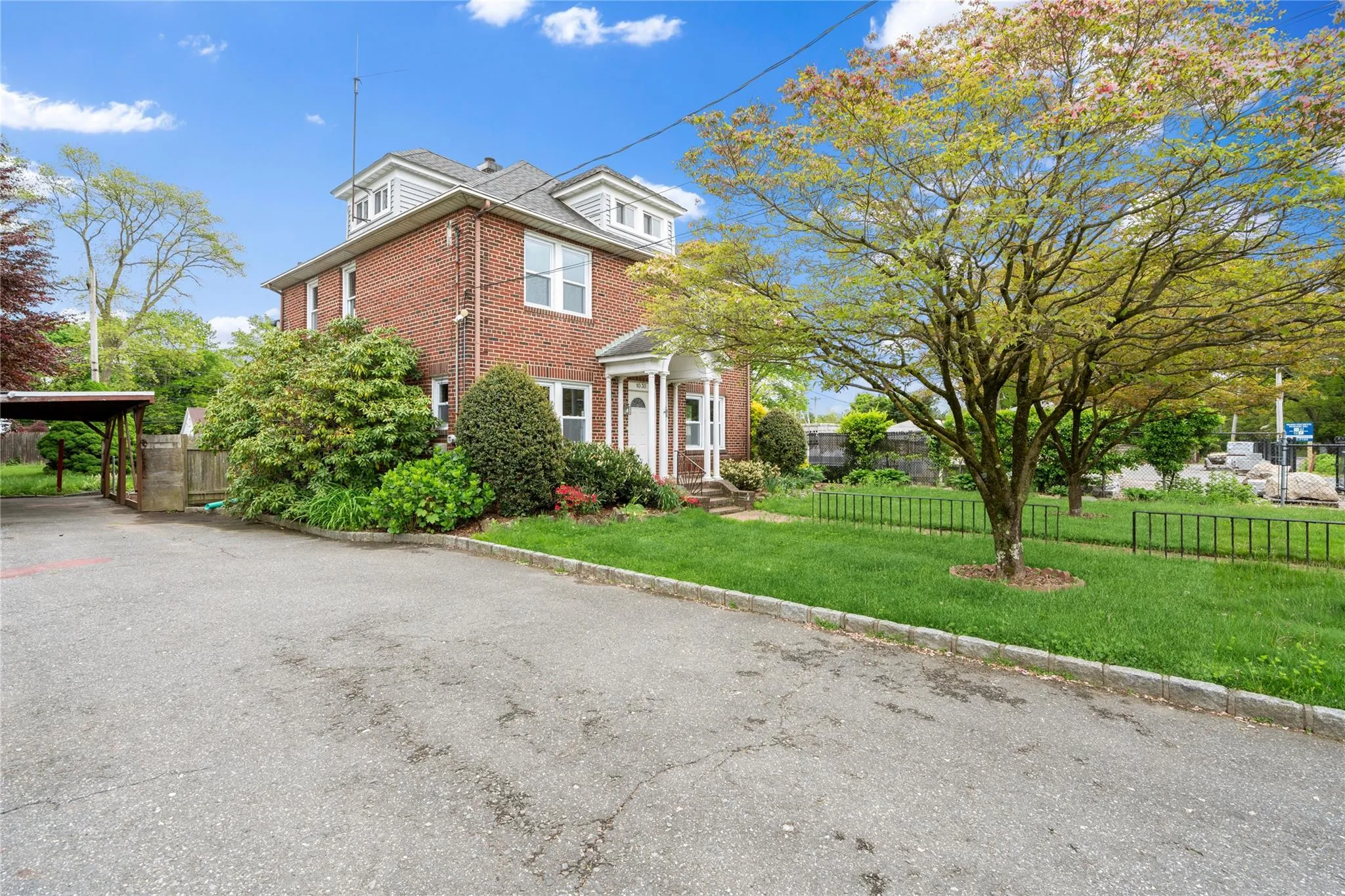 American foursquare style home with brick siding American foursquare style home with brick siding