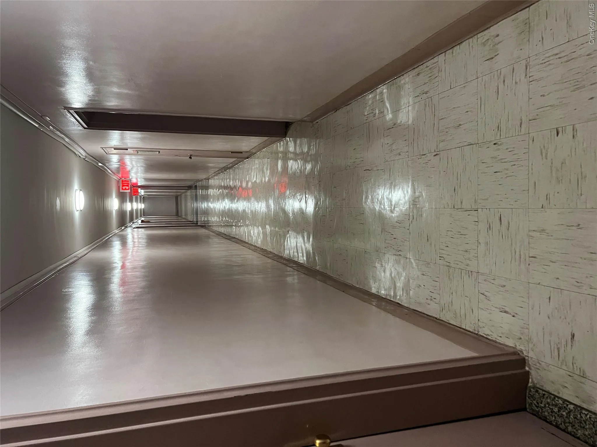 Corridor with light floors and crown molding Corridor with light floors and crown molding
