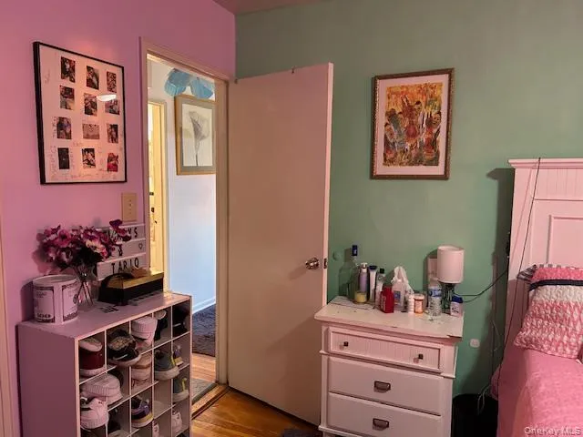 Bedroom with wood finished floors Bedroom with wood finished floors
