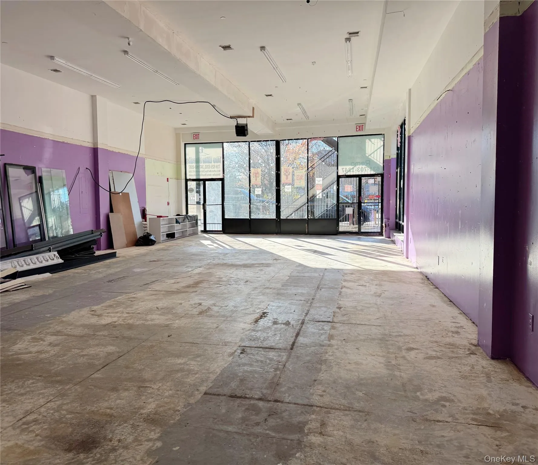 Spare room featuring concrete flooring Spare room featuring concrete flooring