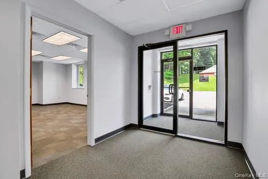 Lobby with a paneled ceiling Lobby with a paneled ceiling