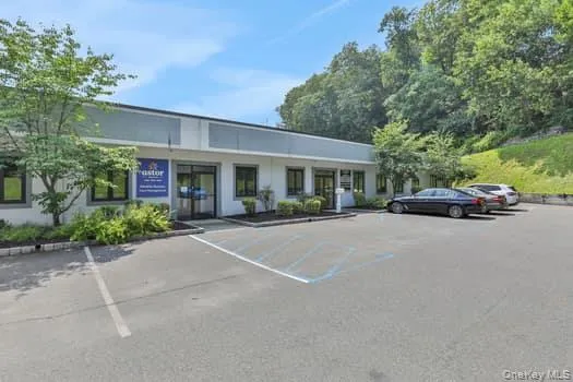 View of commercial location with uncovered parking View of commercial location with uncovered parking