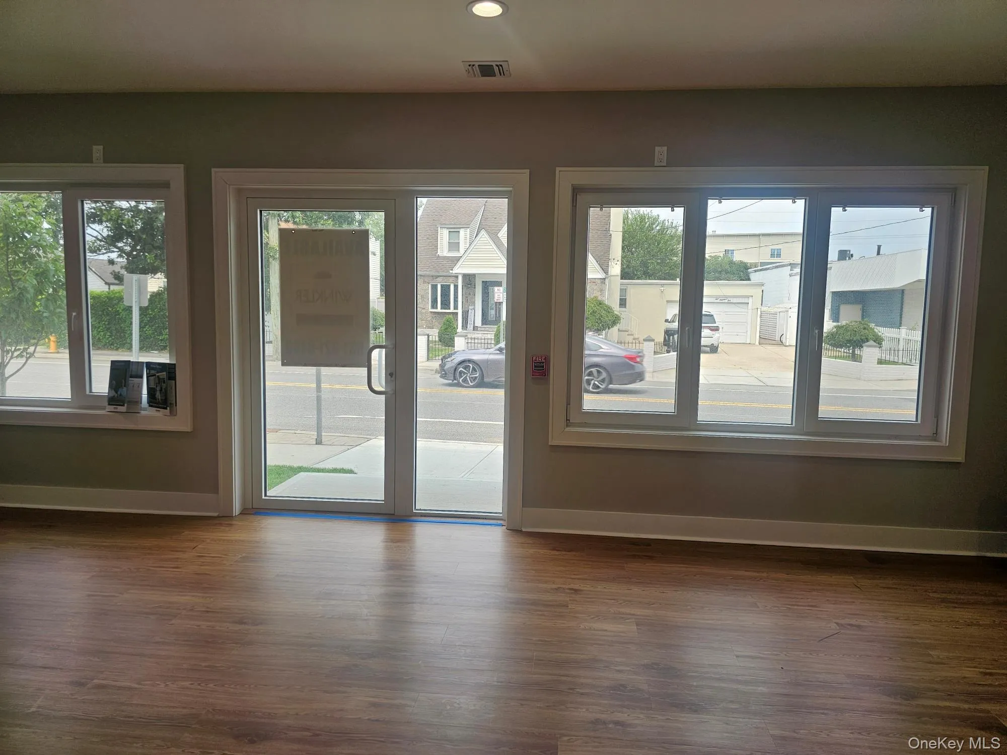 Entryway with plenty of natural light, dark wood finished floors, and recessed lighting Entryway with plenty of natural light, dark wood finished floors, and recessed lighting