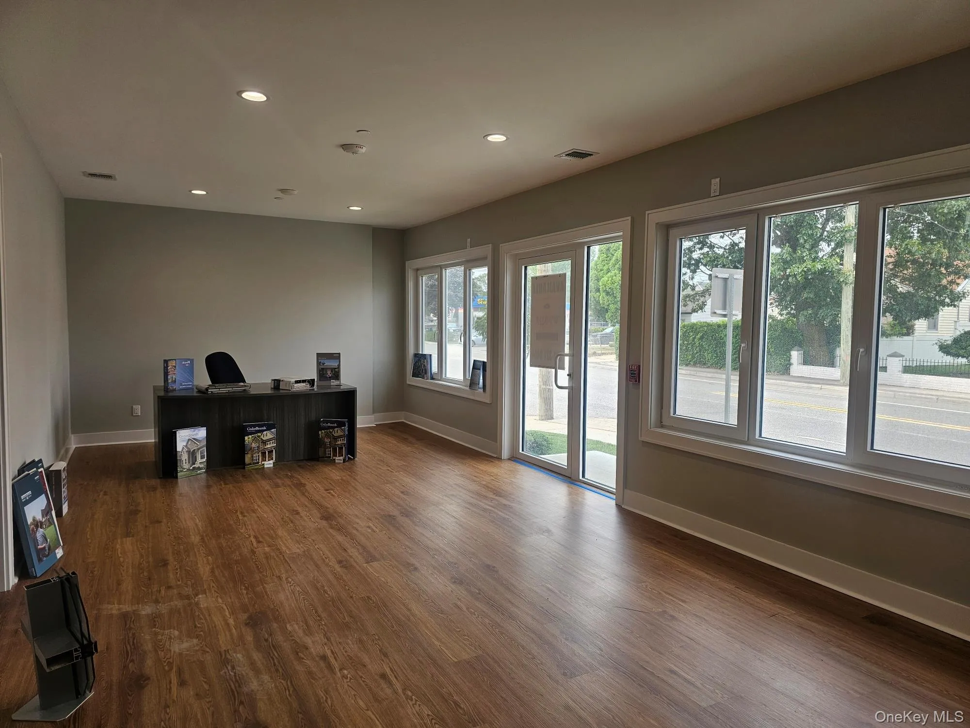 Office featuring recessed lighting and dark wood-type flooring Office featuring recessed lighting and dark wood-type flooring
