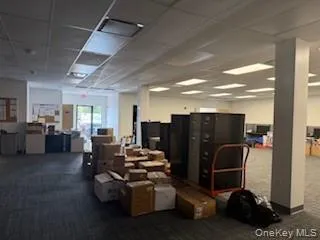 Common area with a paneled ceiling Common area with a paneled ceiling