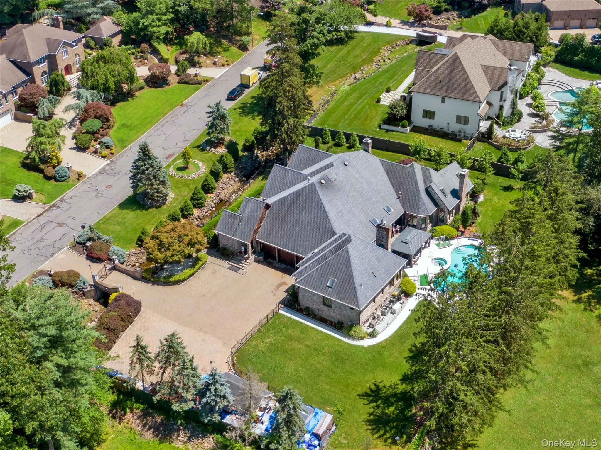Aerial view of residential area featuring a pool Aerial view of residential area featuring a pool