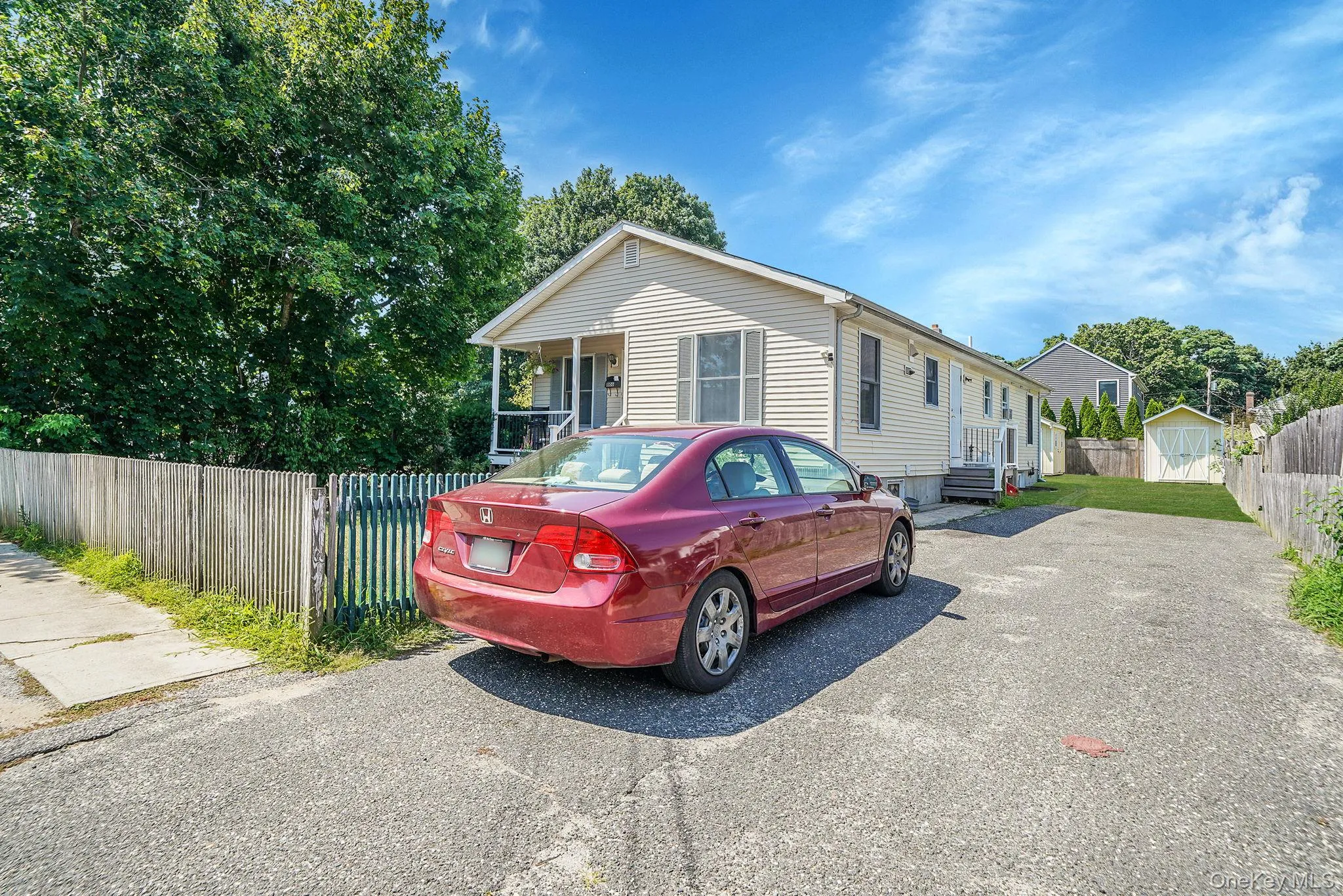 View of front facade with an outbuilding View of front facade with an outbuilding