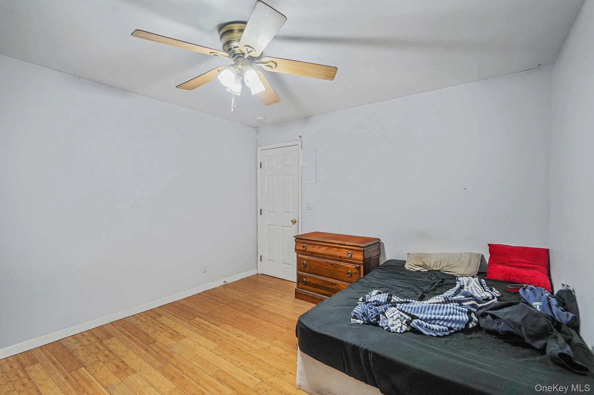 2nd Bedroom with light wood-style floors and a ceiling fan 2nd Bedroom with light wood-style floors and a ceiling fan