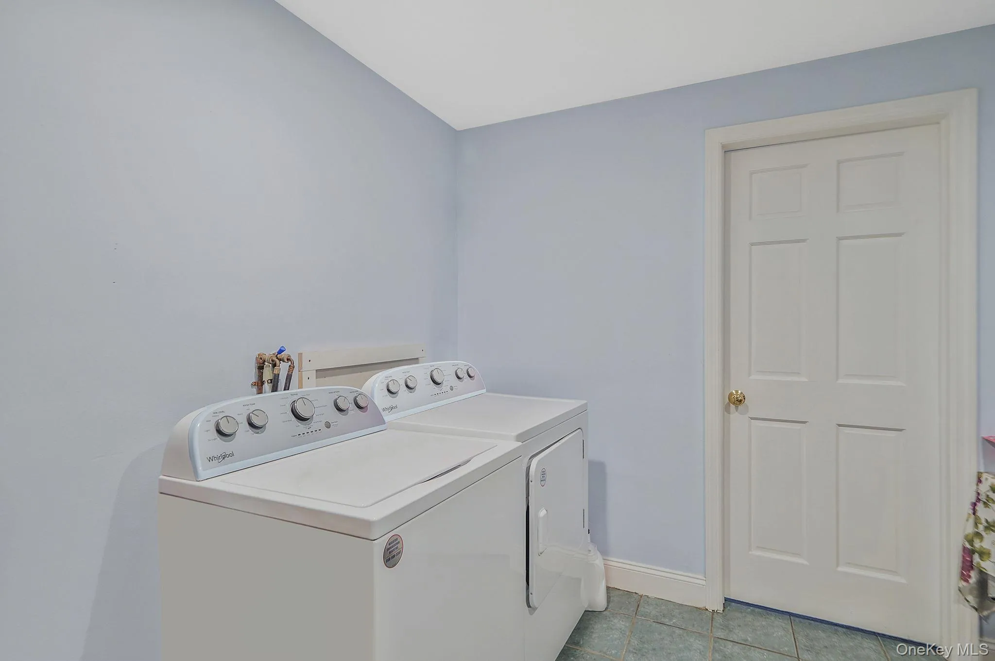 2nd of 2 Laundry rooms featuring washer and clothes dryer. 2nd of 2 Laundry rooms featuring washer and clothes dryer.