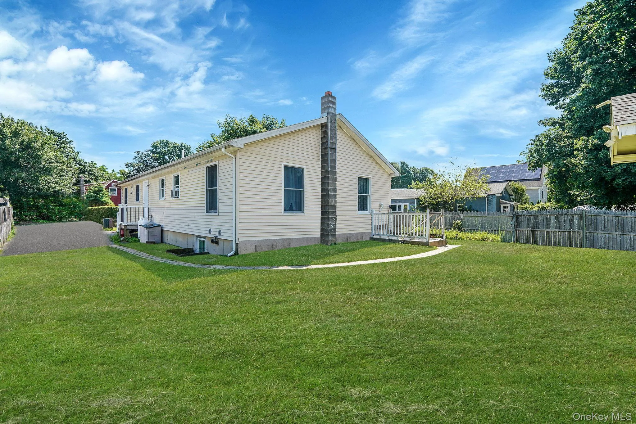 Rear of Property. Nice Size yard to Relax Rear of Property. Nice Size yard to Relax