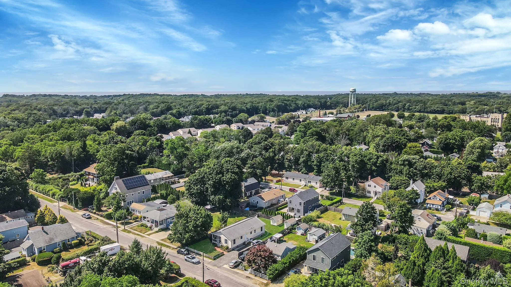 Aerial perspective of suburban area with two coast lines Aerial perspective of suburban area with two coast lines