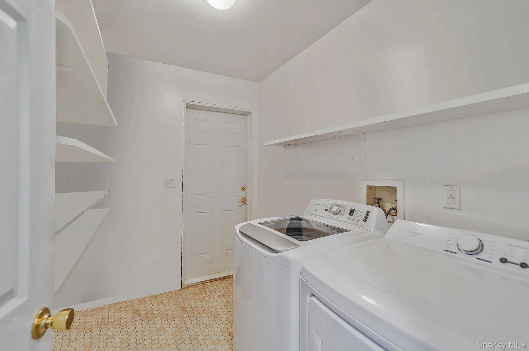 1 of 2 Laundry Rooms featuring washing machine and clothes dryer. 1 of 2 Laundry Rooms featuring washing machine and clothes dryer.