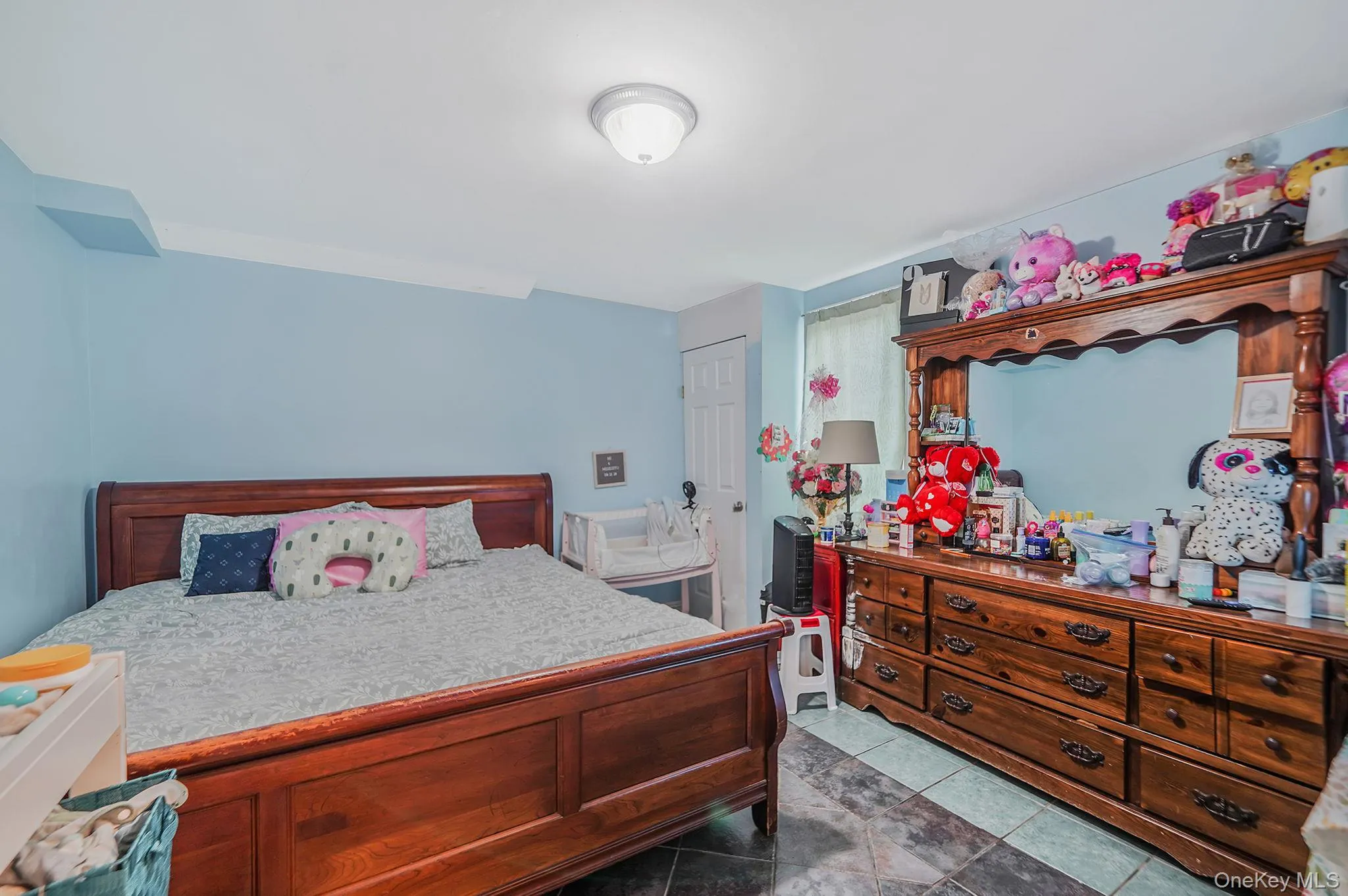 Additonal Bedroom featuring tile patterned floors Additonal Bedroom featuring tile patterned floors