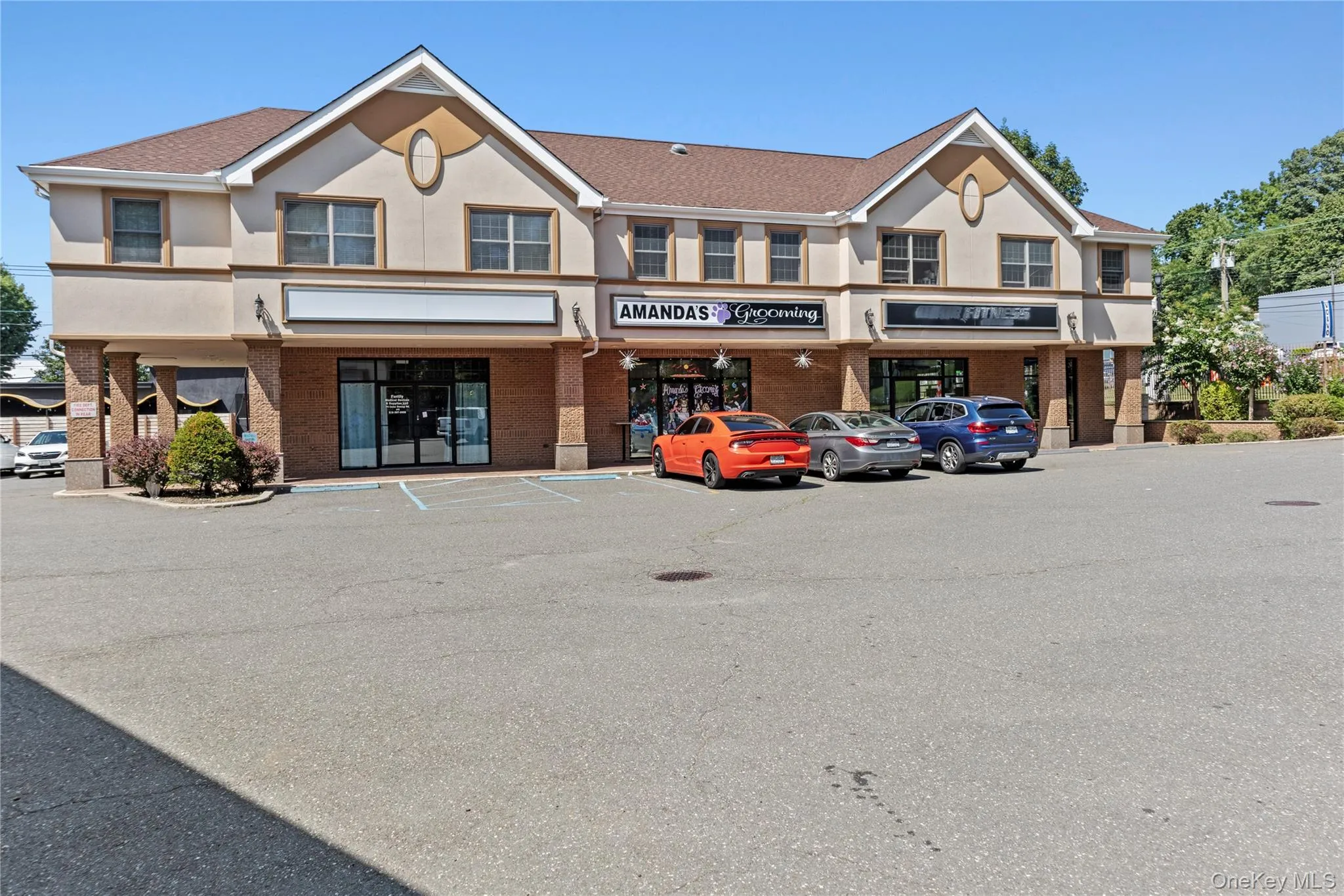 View of commercial location with uncovered parking View of commercial location with uncovered parking