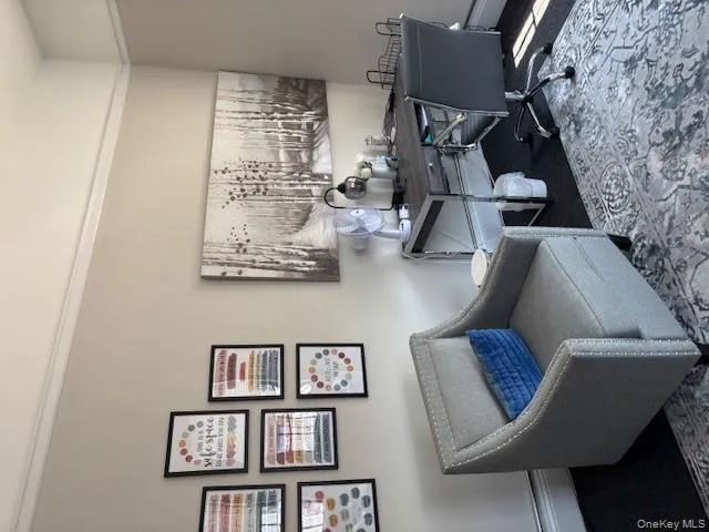 Office with baseboards and carpet floors Office with baseboards and carpet floors