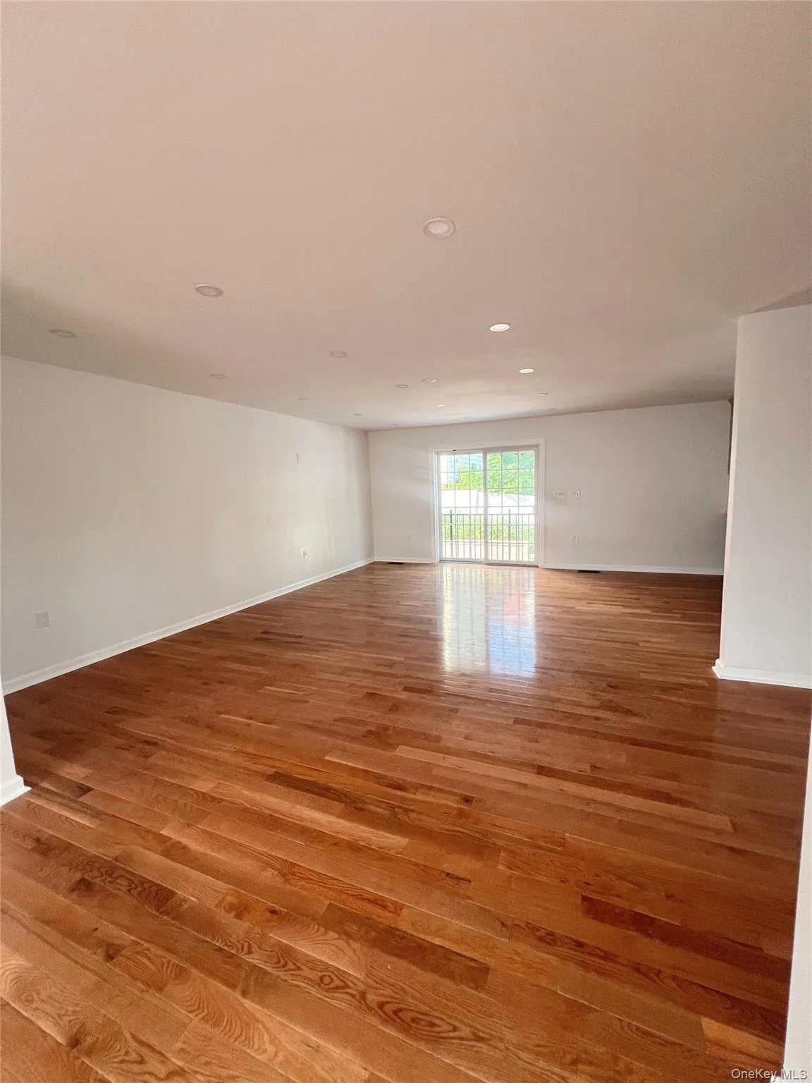 Empty room with recessed lighting and light wood-type flooring Empty room with recessed lighting and light wood-type flooring