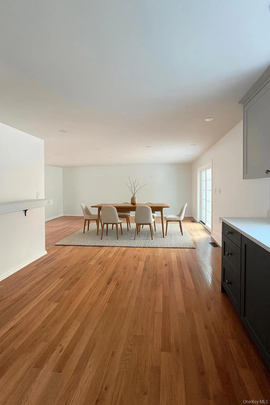Dining room featuring light wood-style flooring Dining room featuring light wood-style flooring