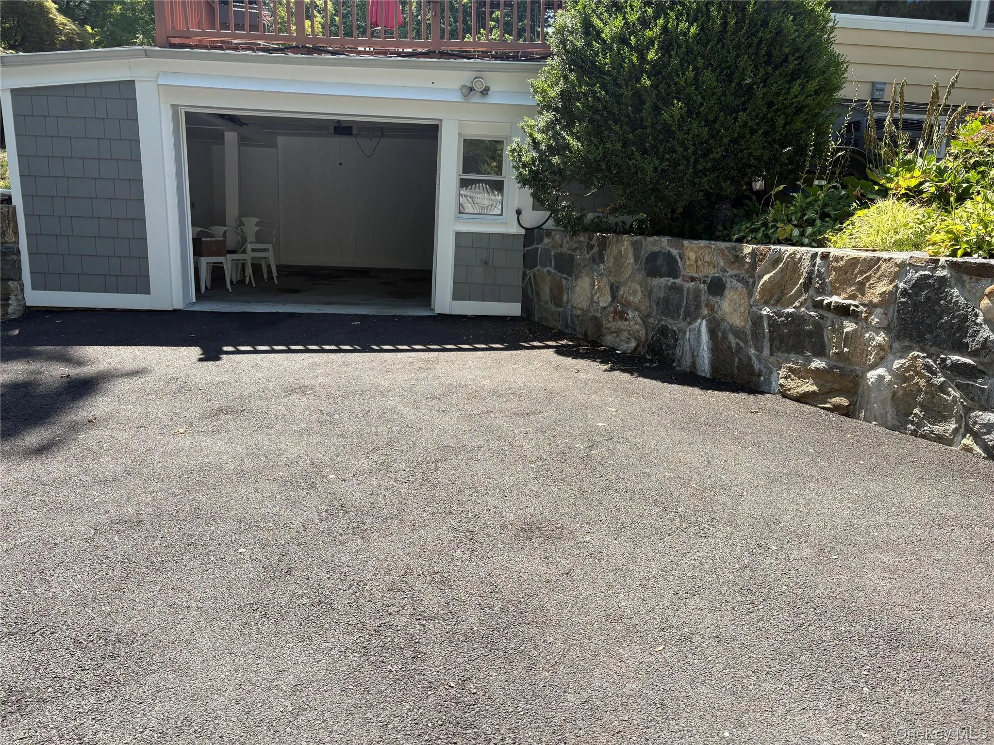 Garage with driveway Garage with driveway