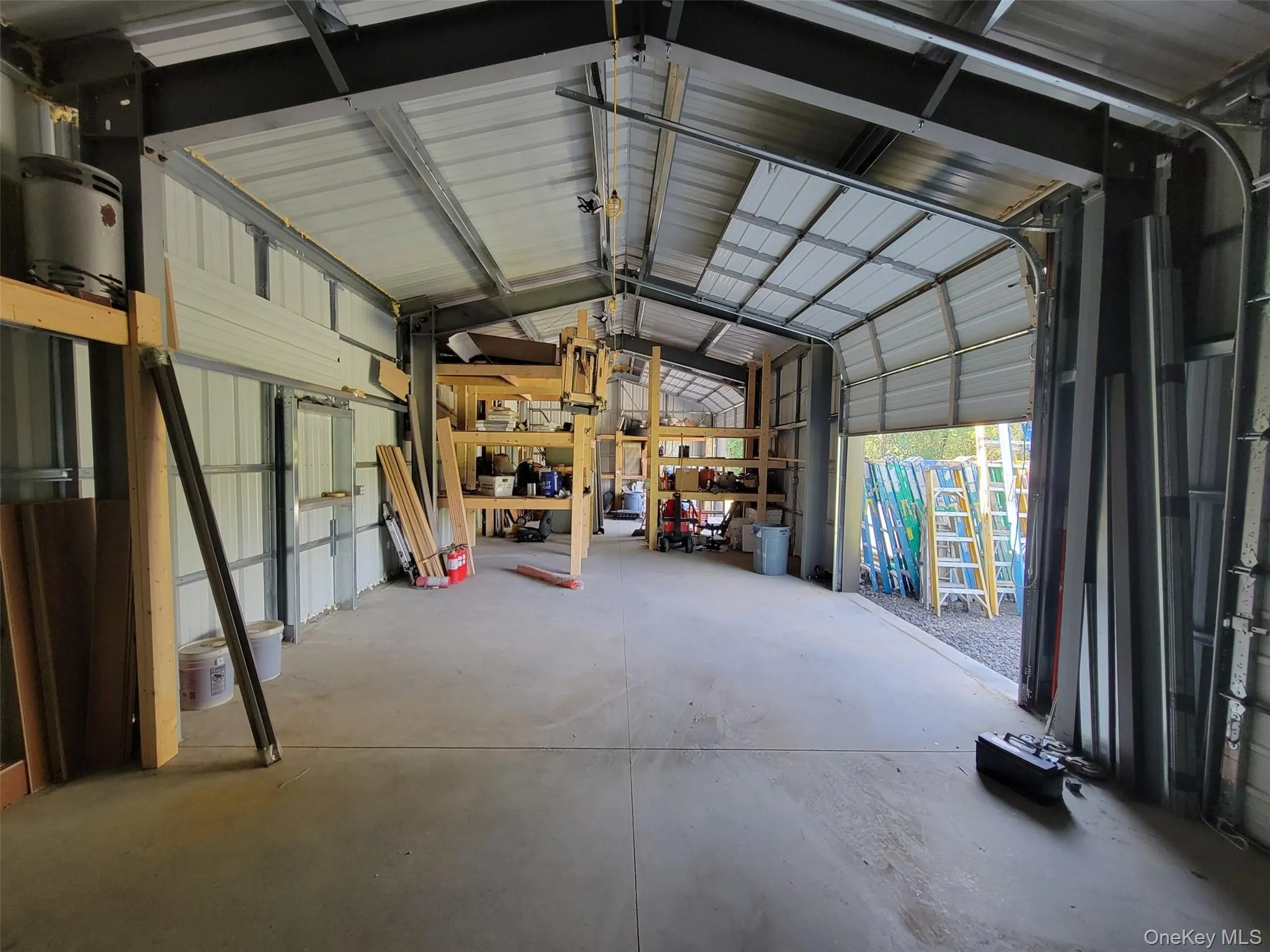 Garage featuring metal wall Garage featuring metal wall