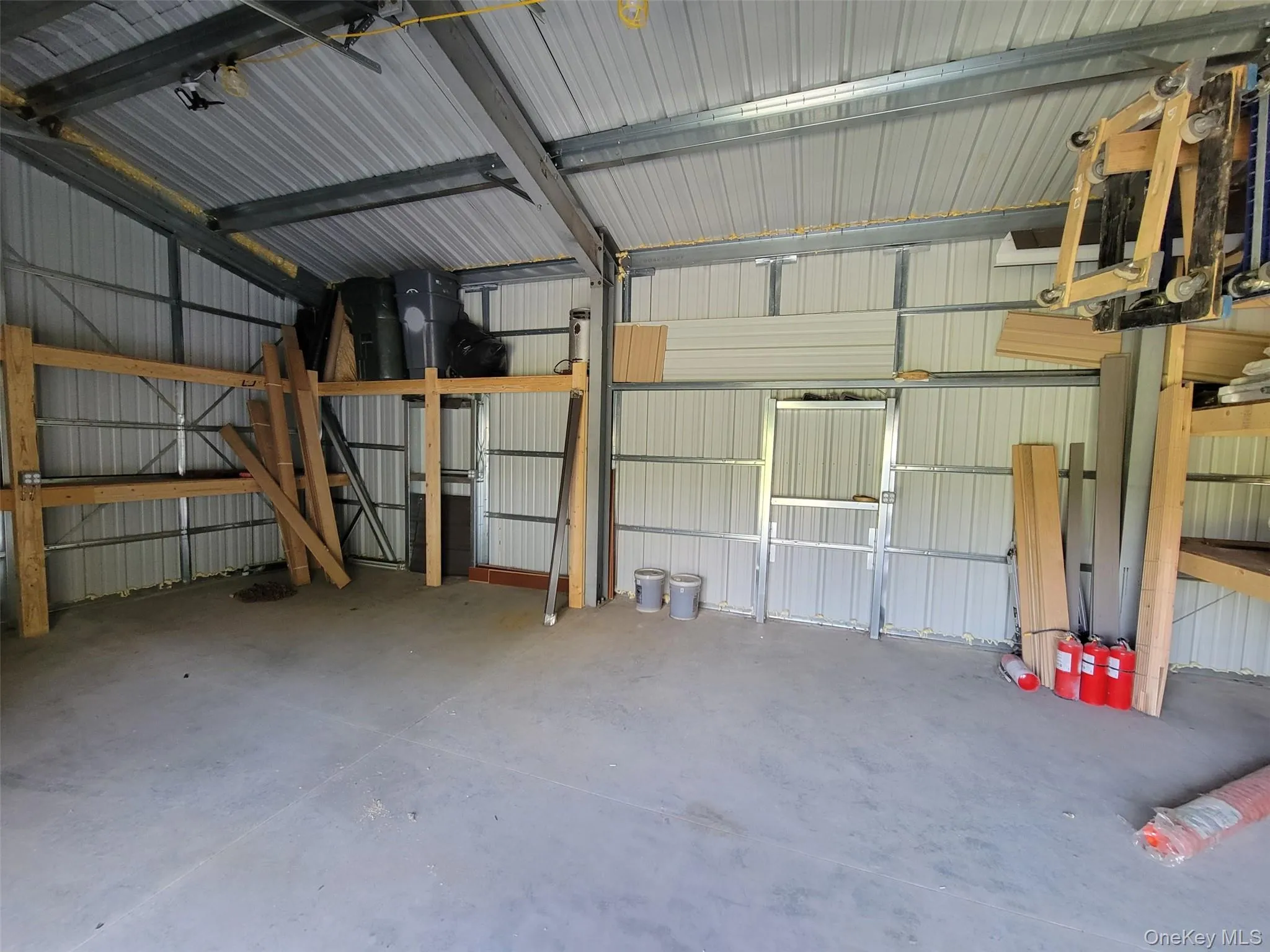 Garage featuring metal wall Garage featuring metal wall