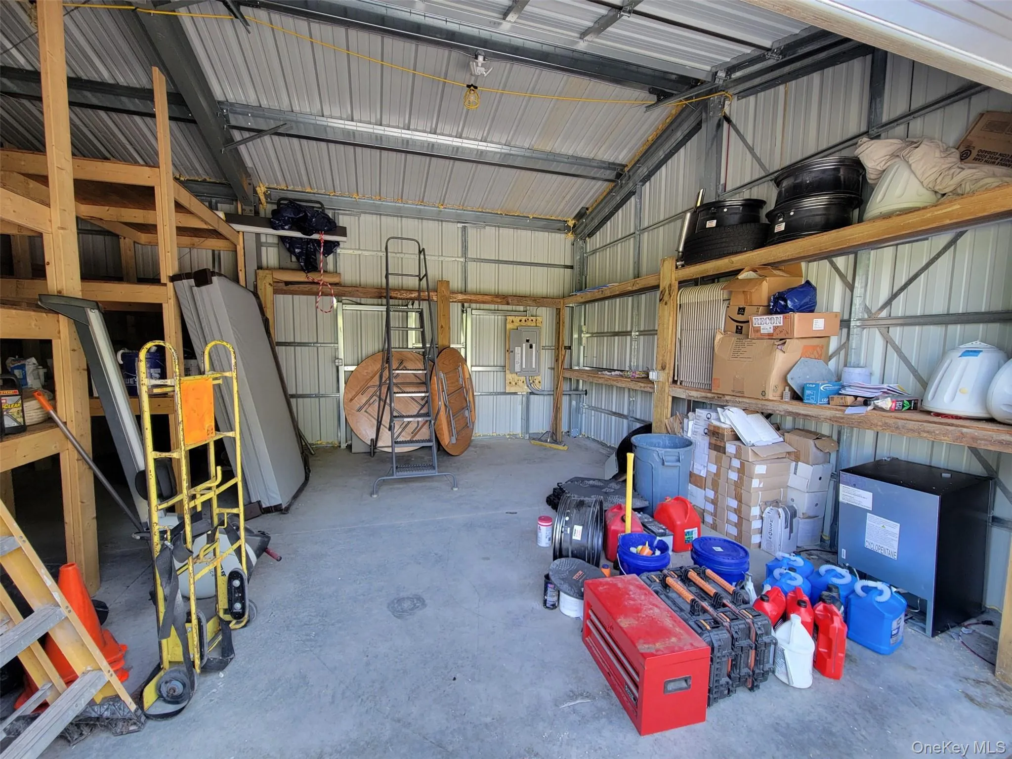 Garage featuring metal wall Garage featuring metal wall