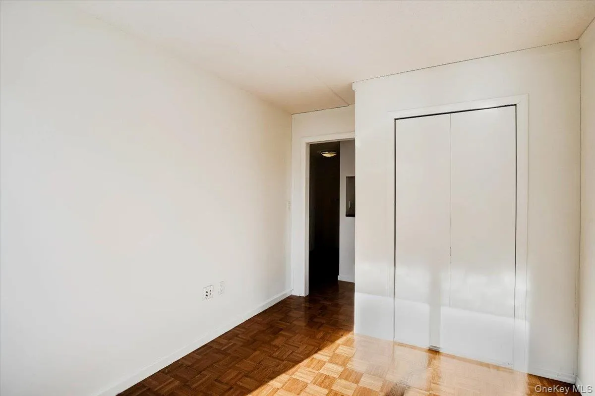 Unfurnished bedroom featuring baseboards and a closet Unfurnished bedroom featuring baseboards and a closet