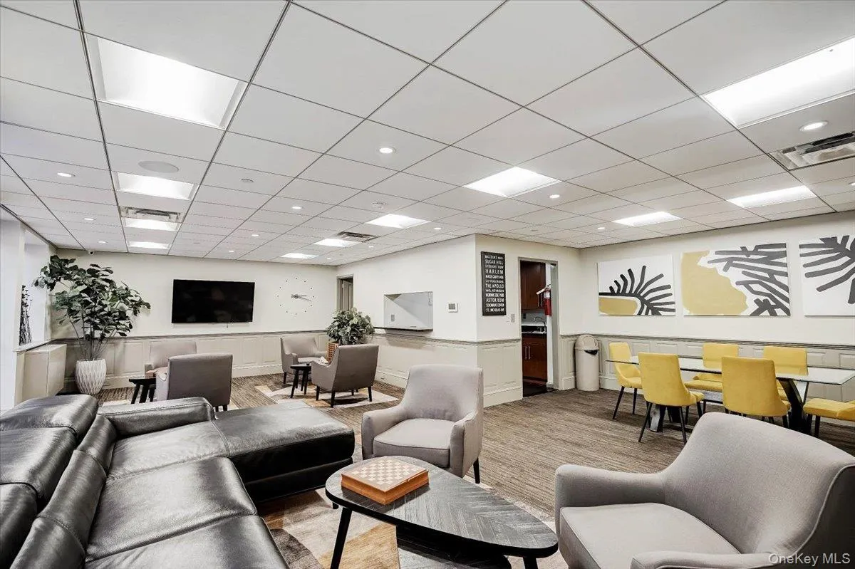 Lobby featuring a drop ceiling and recessed lighting Lobby featuring a drop ceiling and recessed lighting