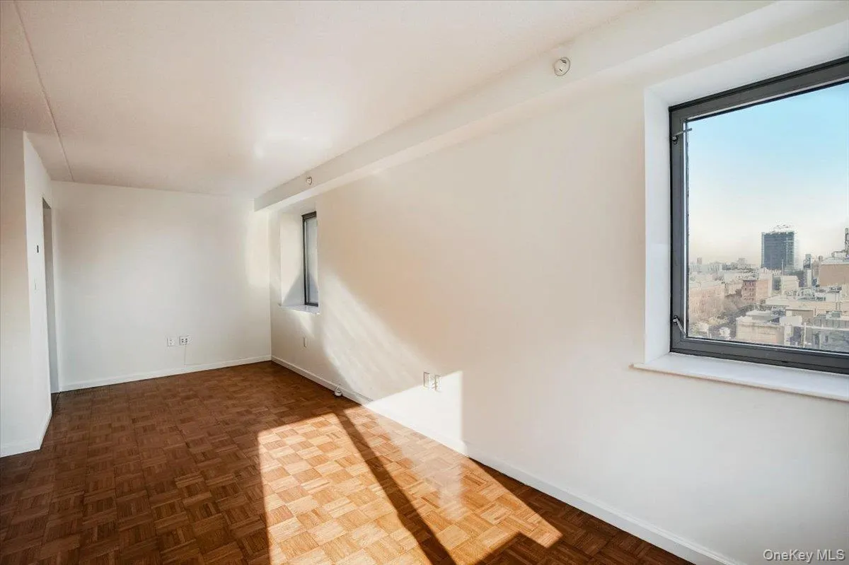 Empty room with baseboards Empty room with baseboards