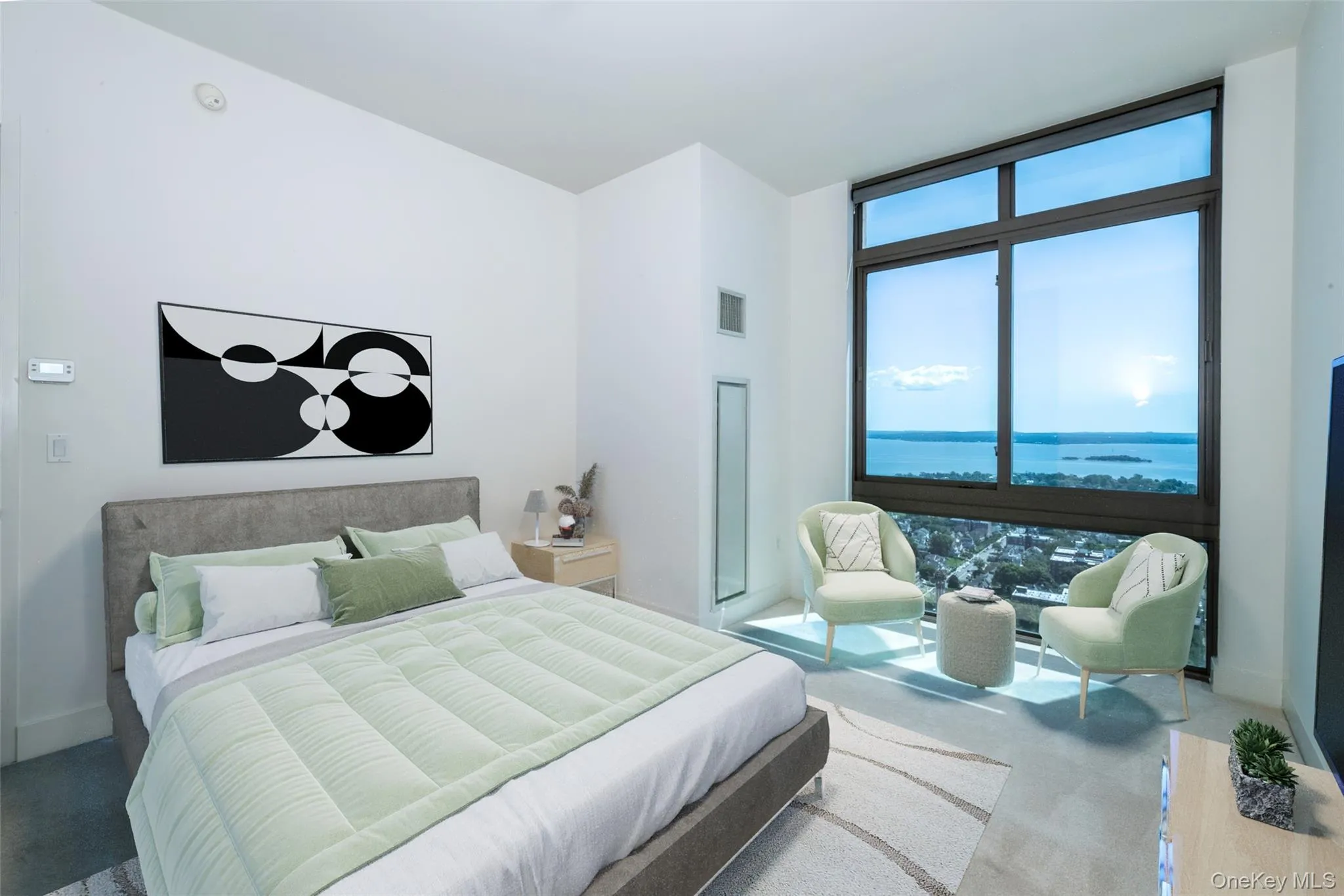 Bedroom featuring a wall of windows, carpet, and a water view Bedroom featuring a wall of windows, carpet, and a water view