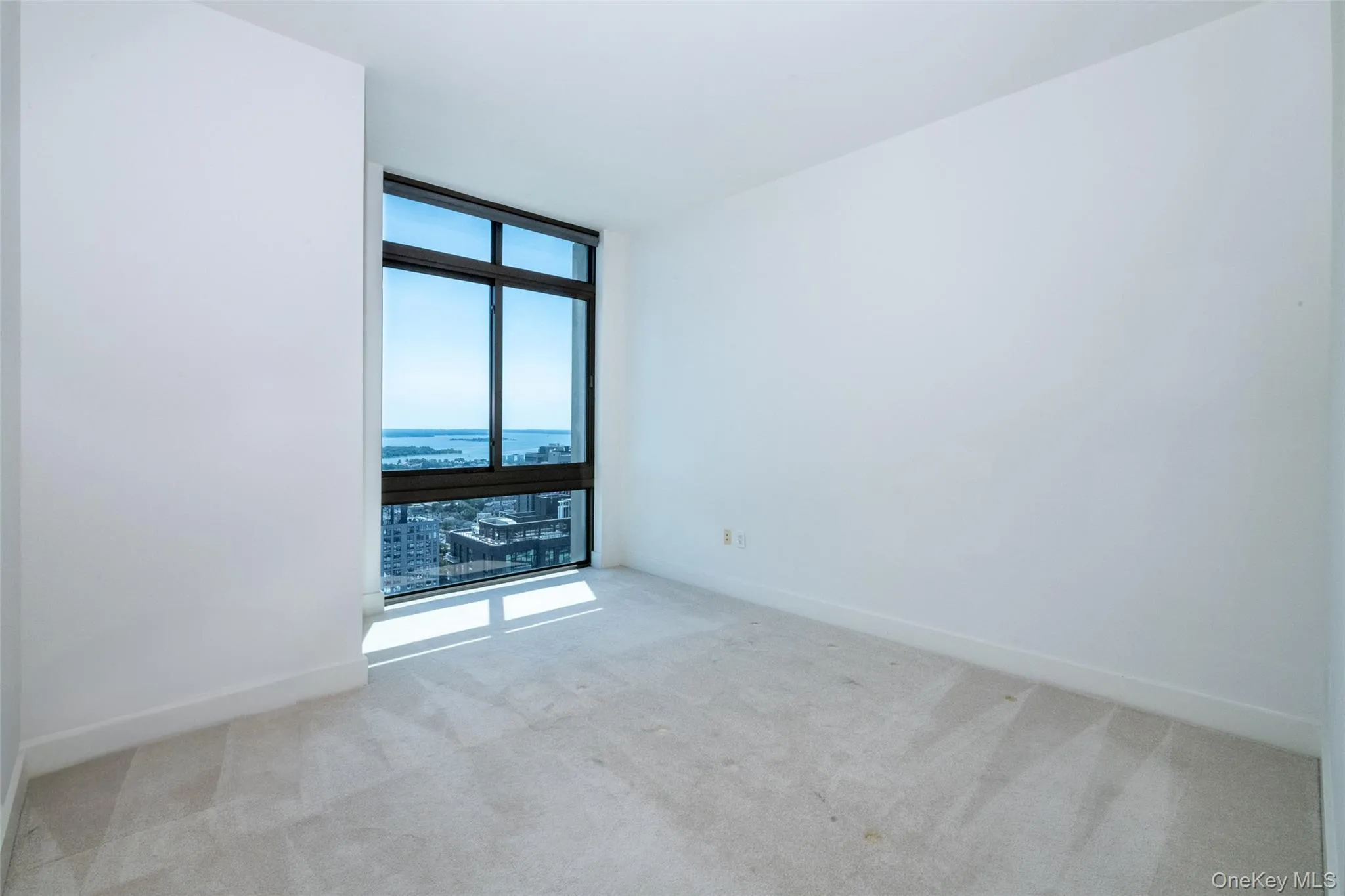 With floor to ceiling windows with amazing water views With floor to ceiling windows with amazing water views