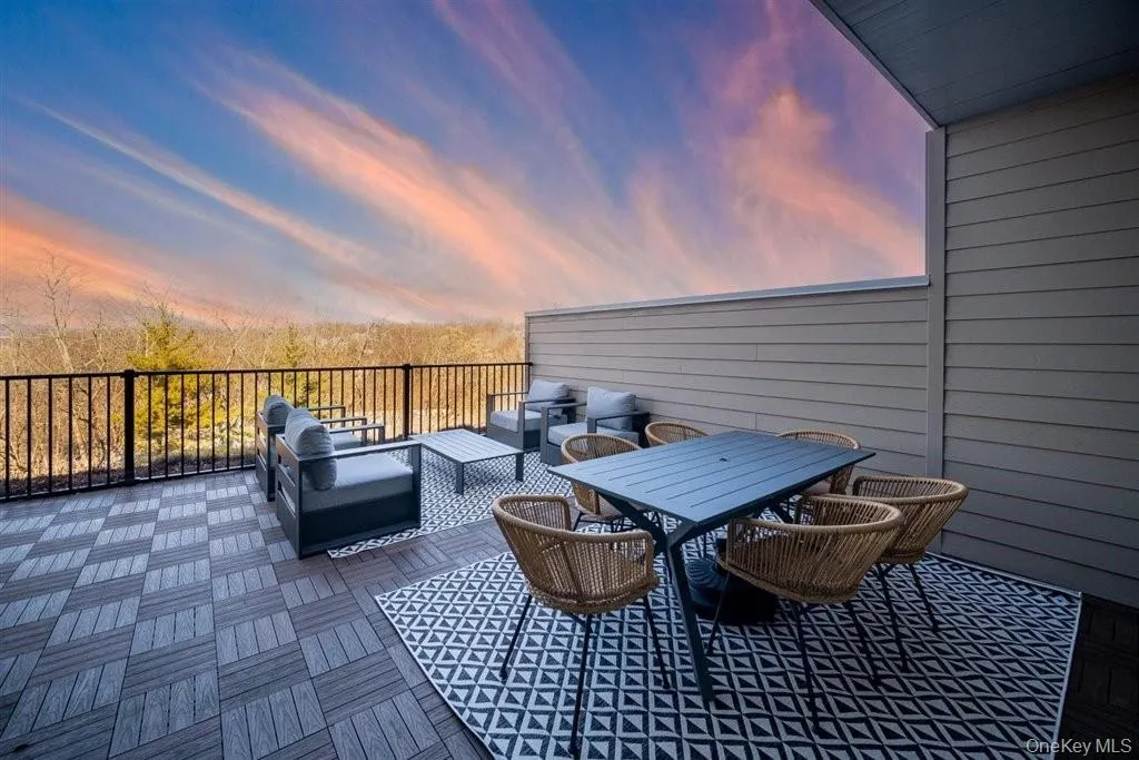 View of patio / terrace with outdoor lounge area and outdoor dining area View of patio / terrace with outdoor lounge area and outdoor dining area
