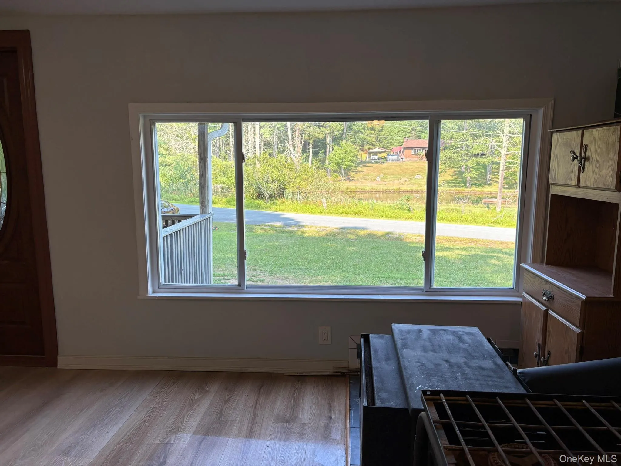 Dining room with wood finished floors and healthy amount of natural light Dining room with wood finished floors and healthy amount of natural light