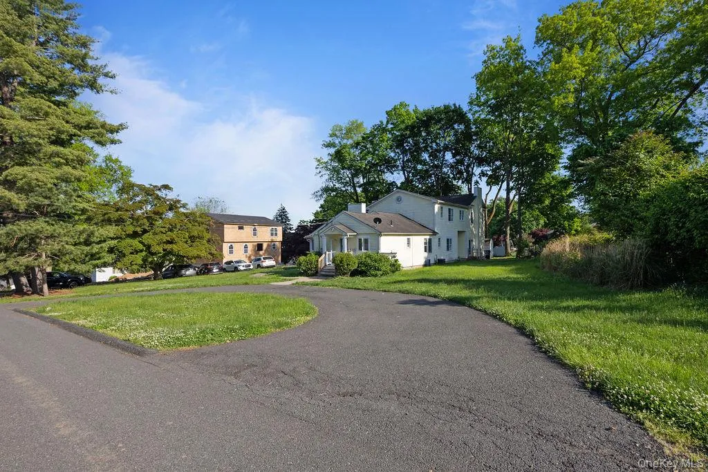 View of front of house featuring a front lawn View of front of house featuring a front lawn