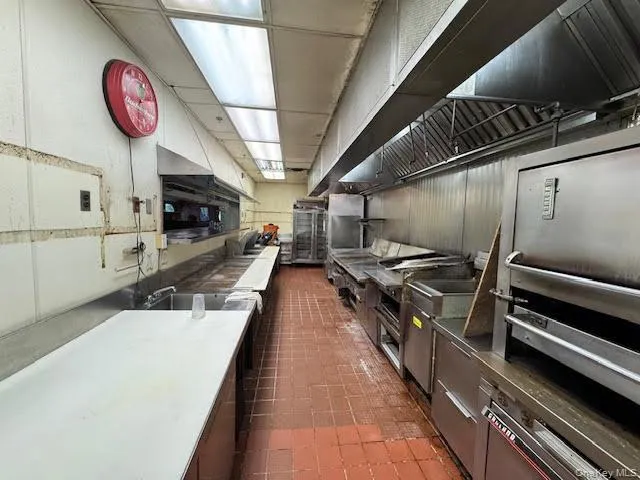 Kitchen with dark countertops and oven Kitchen with dark countertops and oven