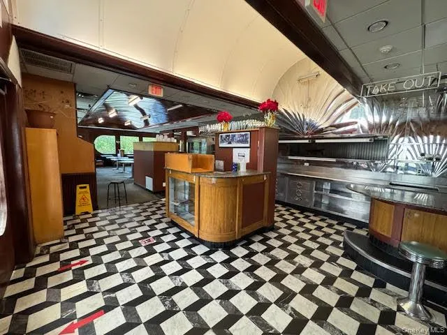 Welcome area featuring a community bar Welcome area featuring a community bar