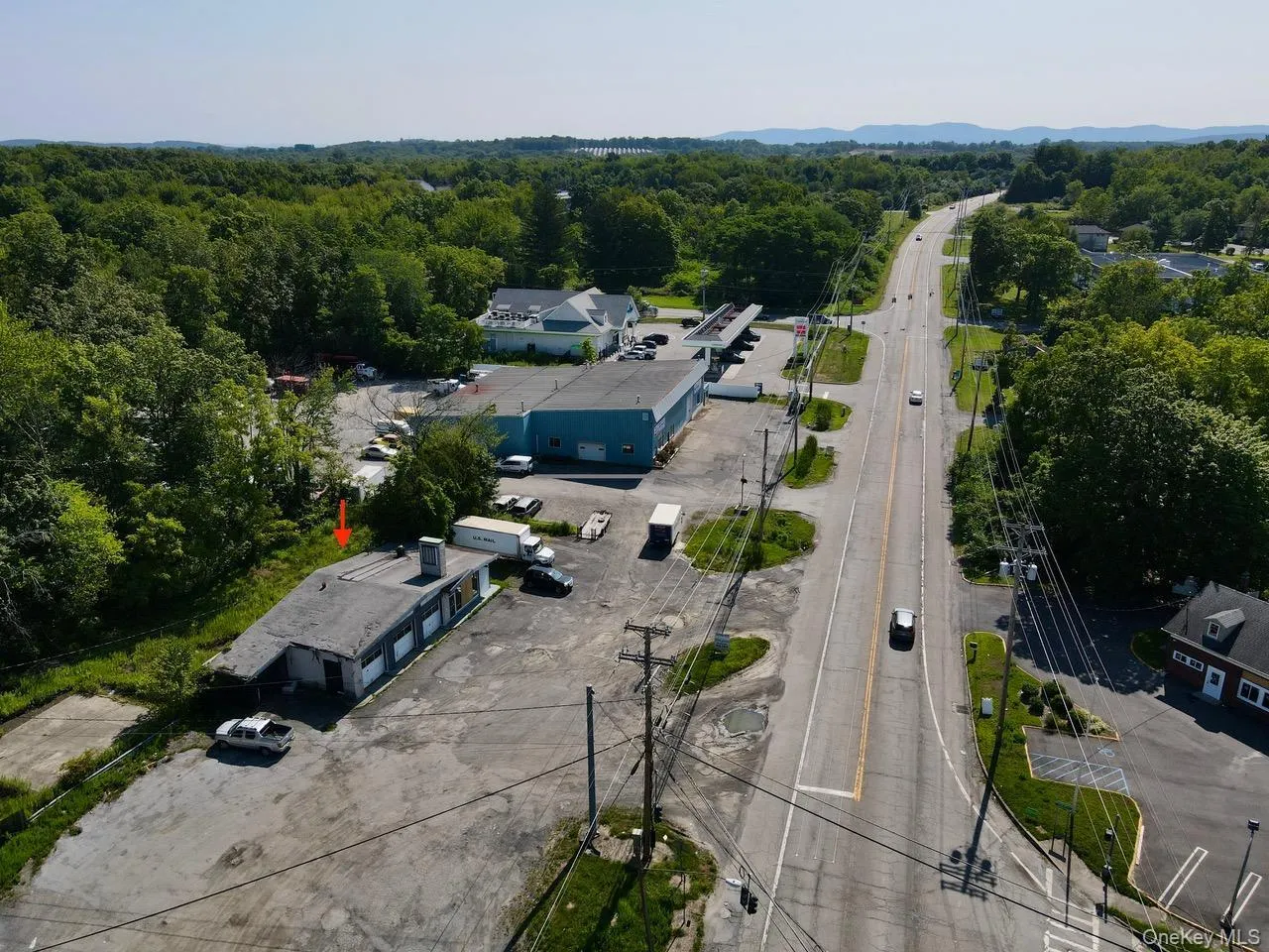 View of property location featuring a heavily wooded area View of property location featuring a heavily wooded area