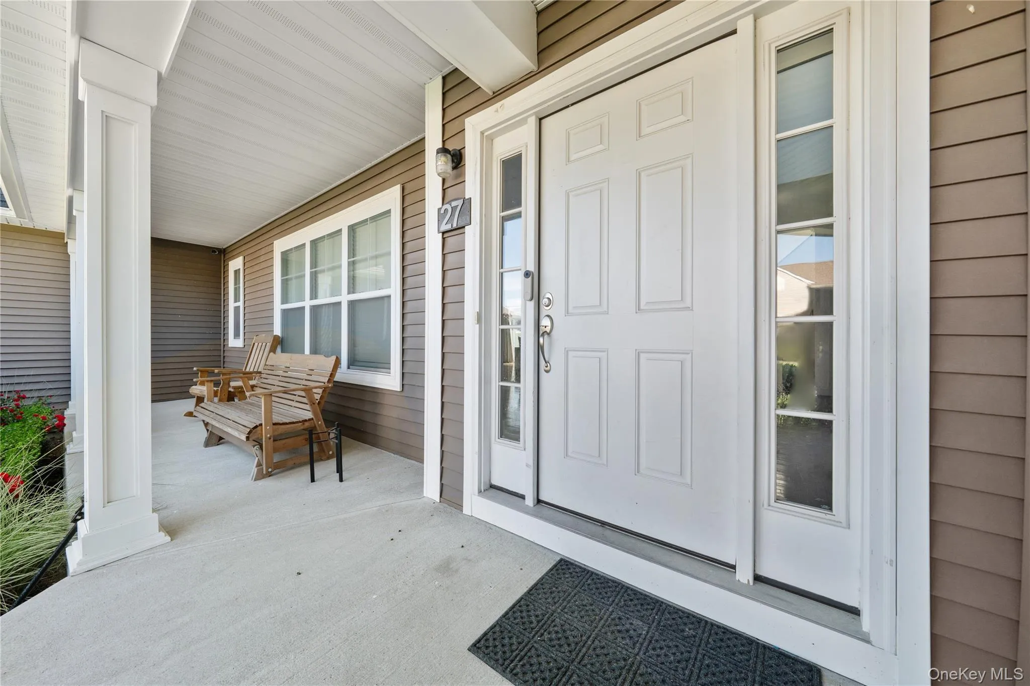 Doorway to property with a porch Doorway to property with a porch