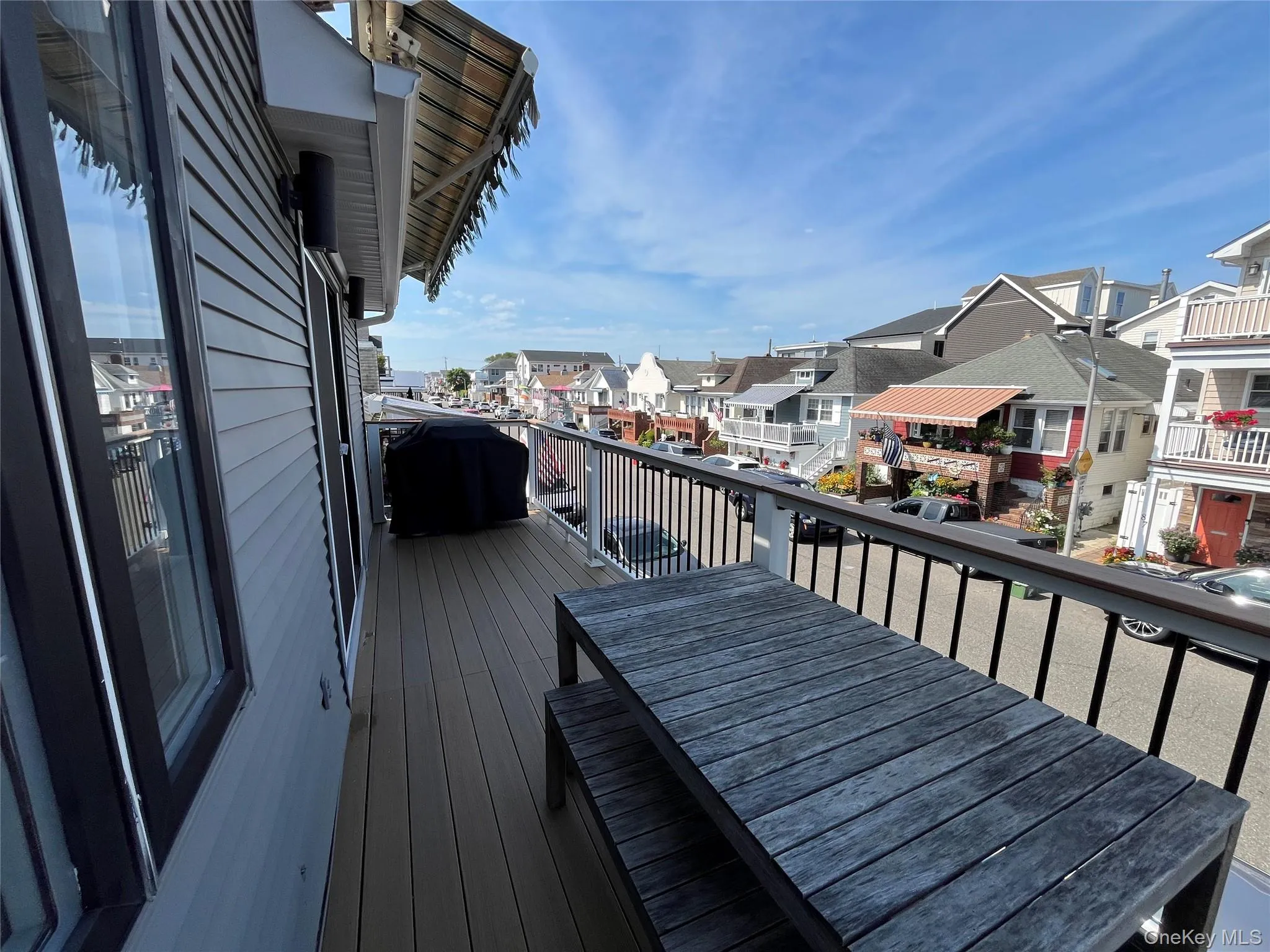 Wooden deck featuring a residential view Wooden deck featuring a residential view