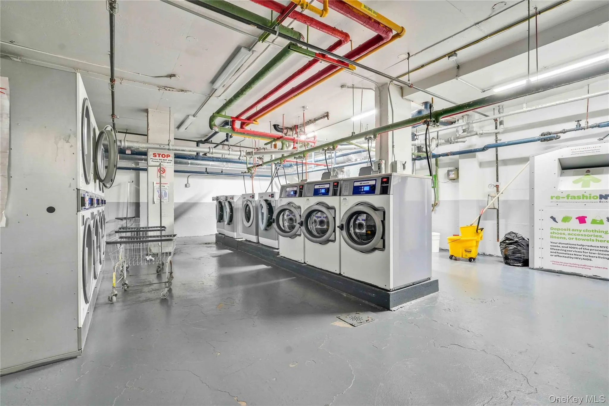 Garage with washer and clothes dryer Garage with washer and clothes dryer