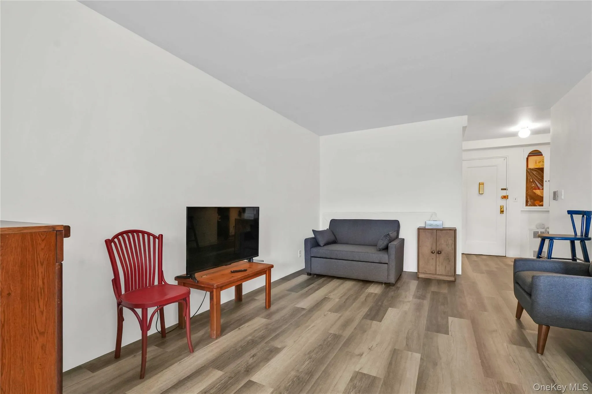 Sitting room with wood finished floors Sitting room with wood finished floors