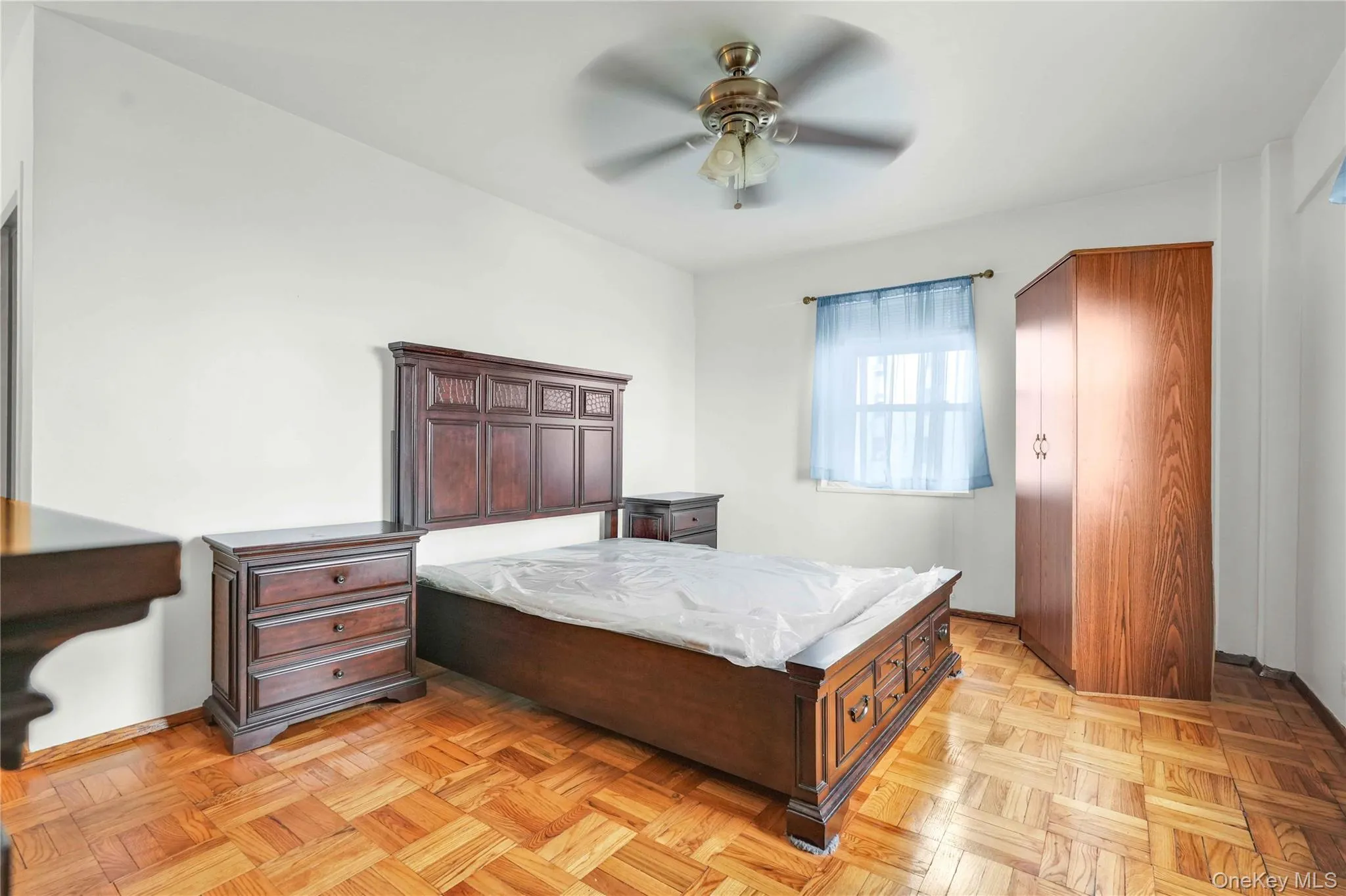 Bedroom featuring a ceiling fan Bedroom featuring a ceiling fan