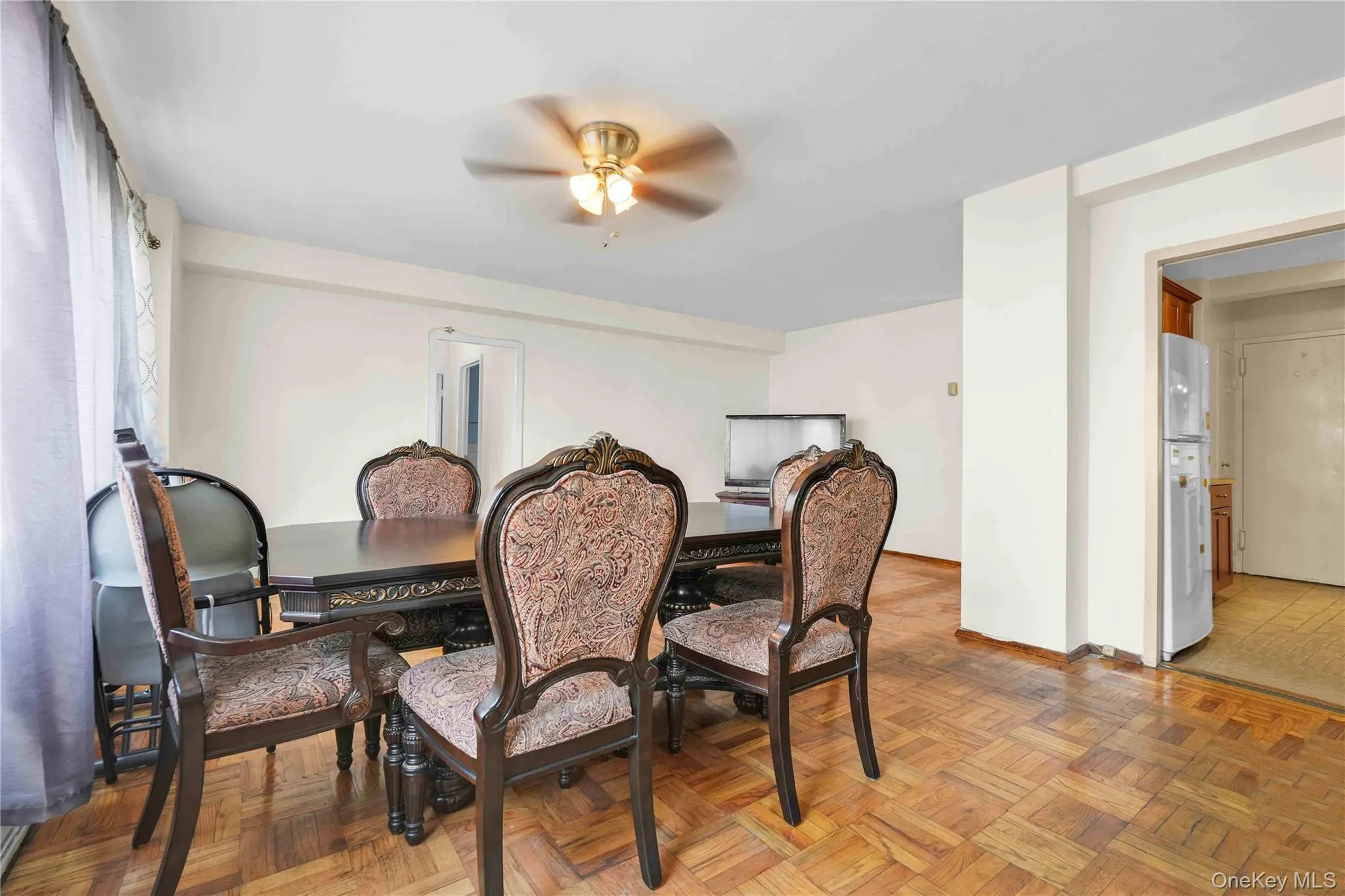 Dining area featuring ceiling fan and baseboards Dining area featuring ceiling fan and baseboards