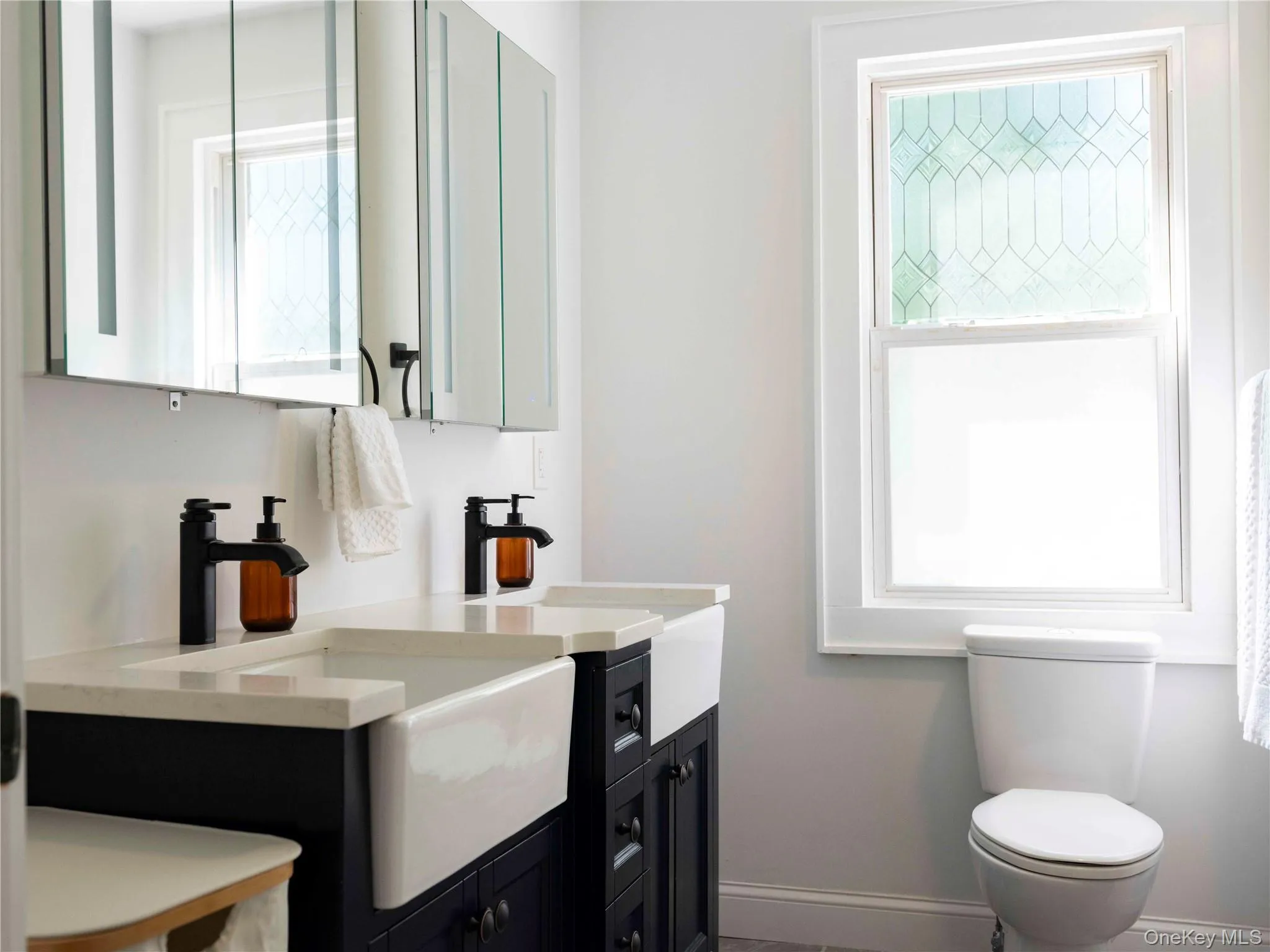 Bathroom with vanity and toilet Bathroom with vanity and toilet