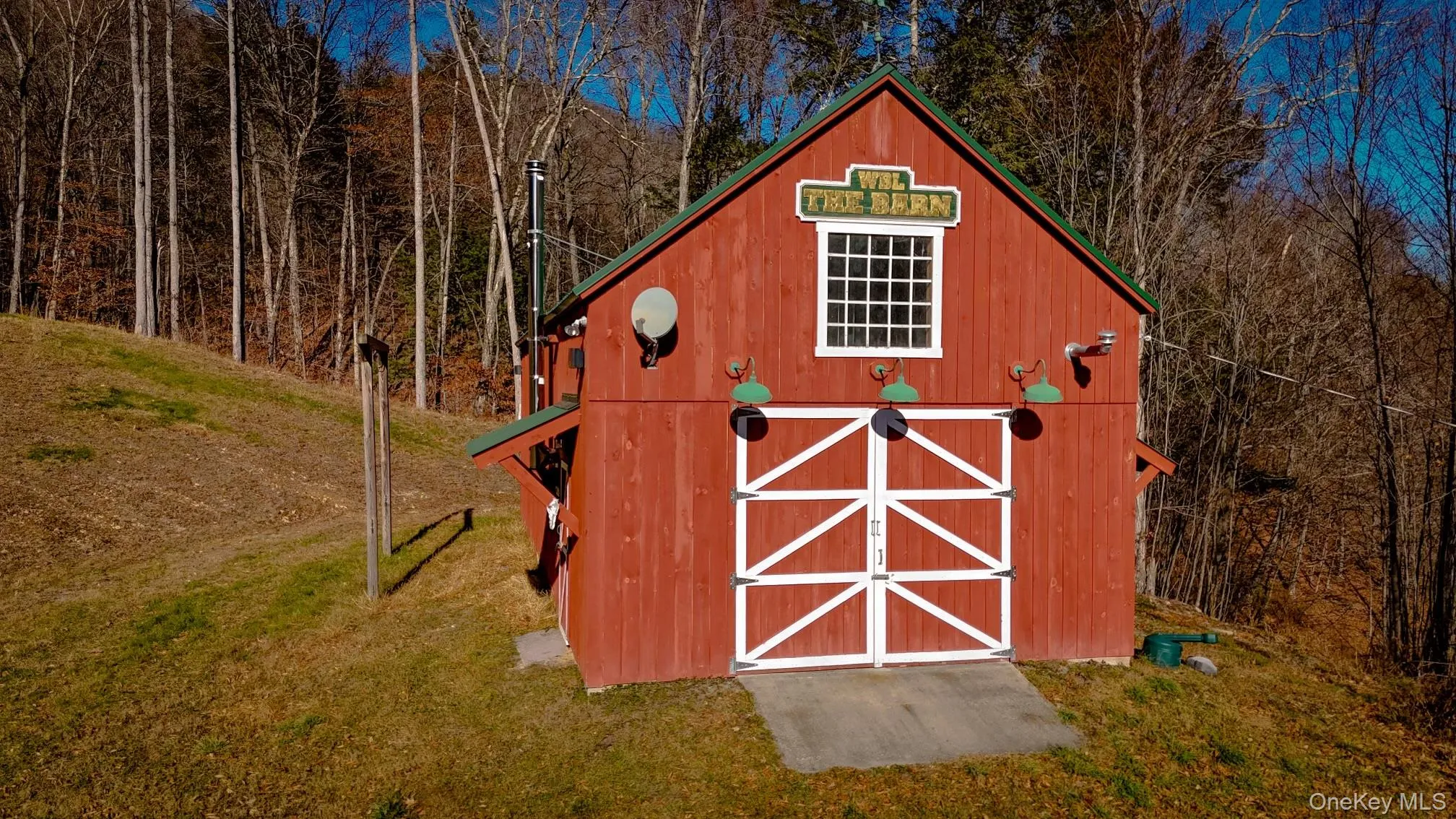 View of barn with a lawn and a forest view View of barn with a lawn and a forest view